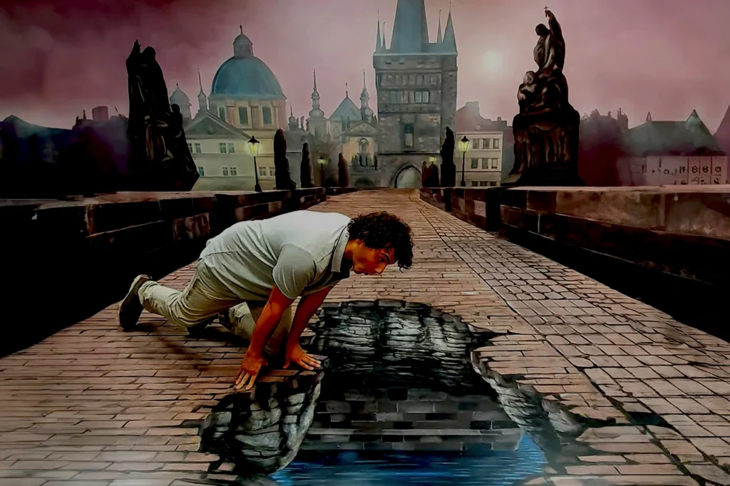 On a gothic cobblestone bridge in Prague at dusk, a performer leans toward a dark reflective surface, echoing the city’s strange history.